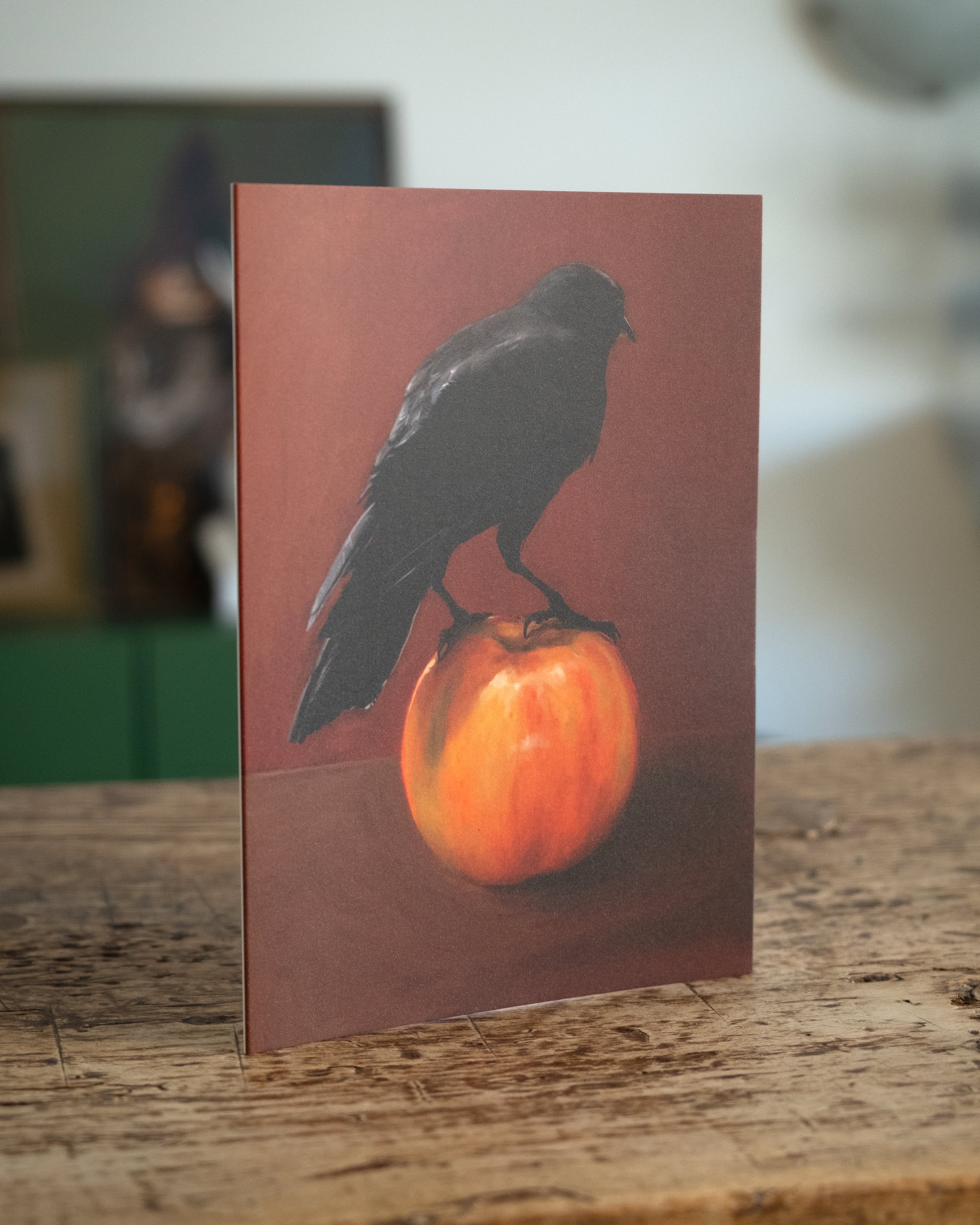 "Crownelius Crowmwell" by Catherine Hébert - Black Crow on Apple - Blank 5"x7" Greeting Card – Blank 5x7 Greeting Card – Gift for Crow Lover