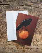 "Crownelius Crowmwell" by Catherine Hébert - Black Crow on Apple - Blank 5"x7" Greeting Card