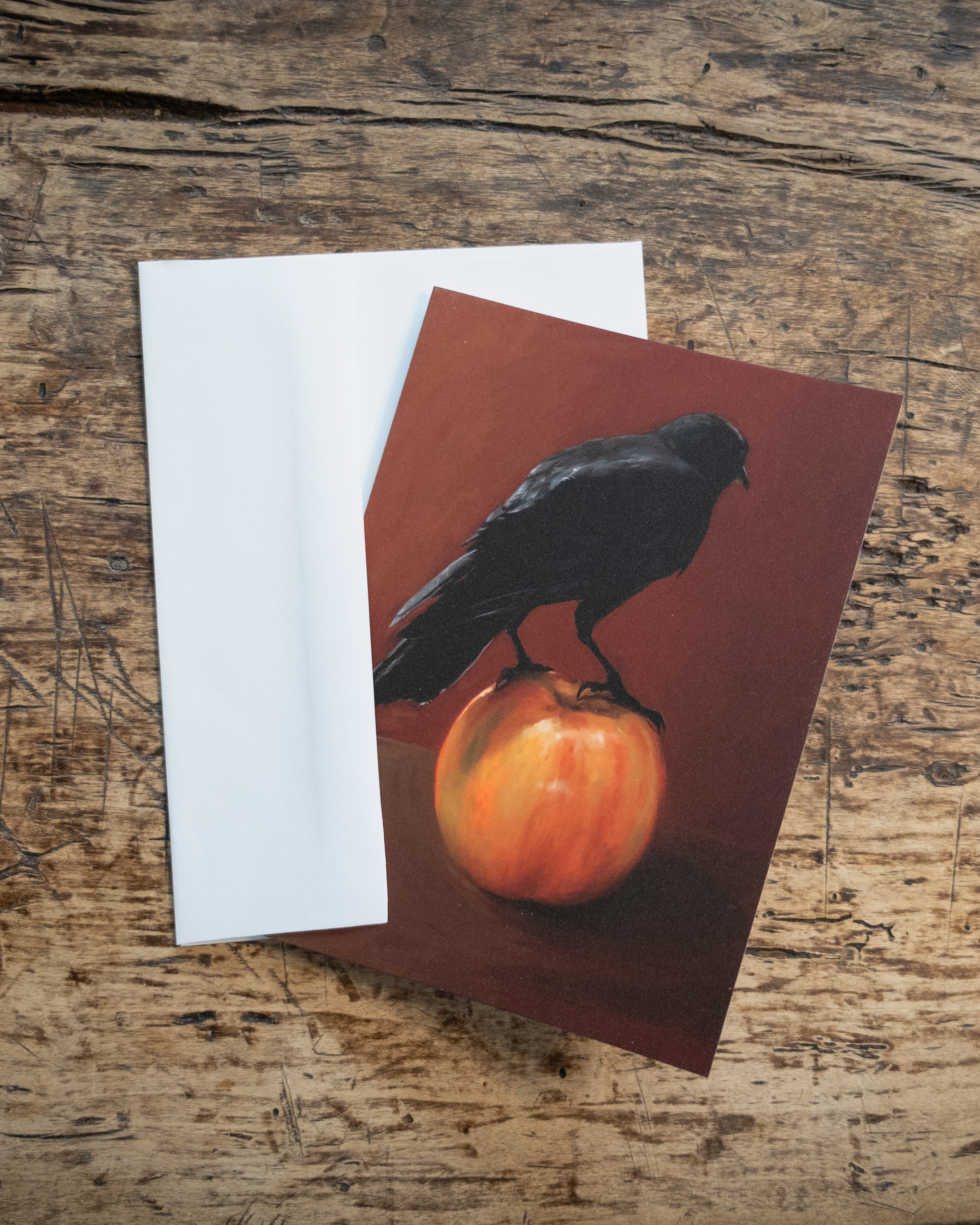 "Crownelius Crowmwell" by Catherine Hébert - Black Crow on Apple - Blank 5"x7" Greeting Card – Blank 5x7 Greeting Card – Gift for Crow Lover
