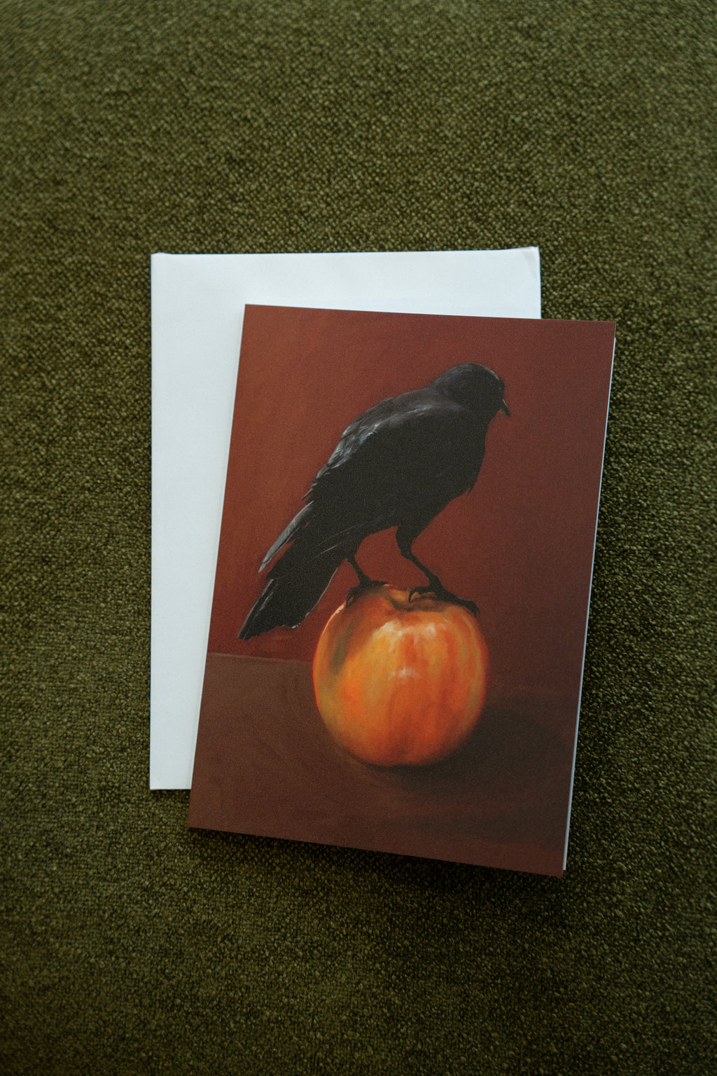 "Crownelius Crowmwell" by Catherine Hébert - Black Crow on Apple - Blank 5"x7" Greeting Card