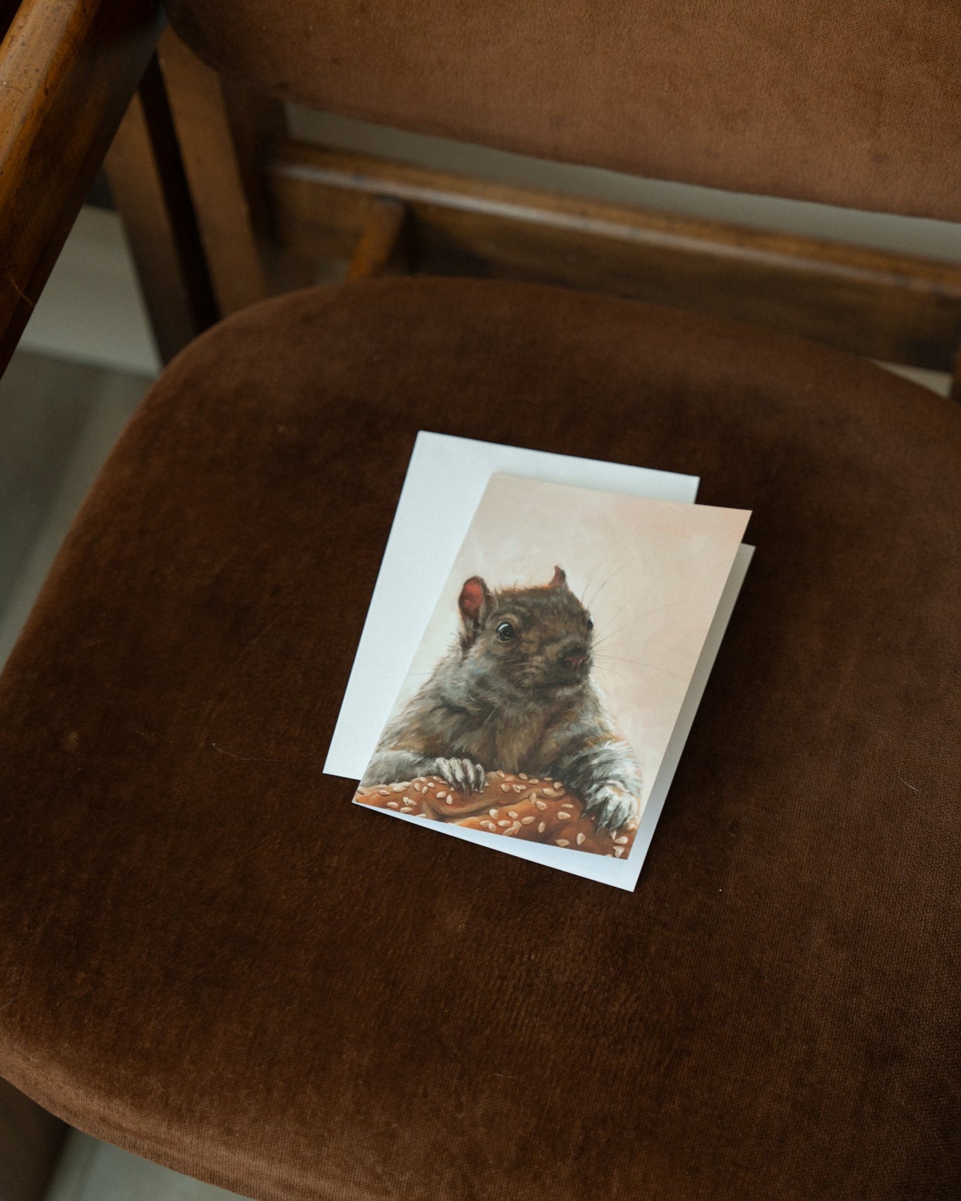 "Brigette With A Bagel" by Catherine Hébert - Grey Squirrel with a Bagel - Blank 5"x7" Greeting Card